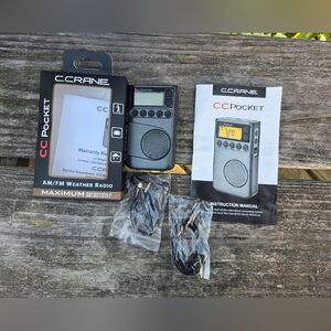 C. Crane CC Pocket AM FM and NOAA Weather Radio with Clock and Sleep Timer